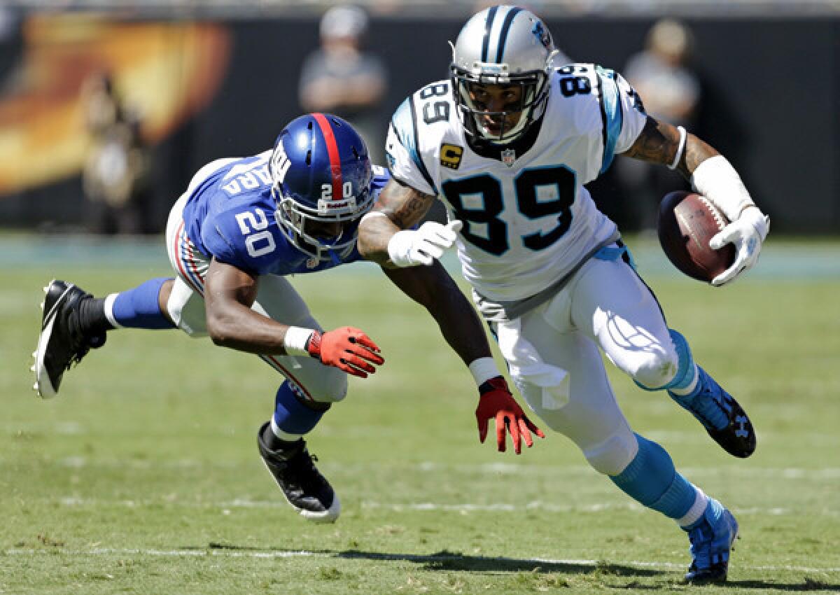 Steve Smith breaks free from Giants cornerback Prince Amukamara during a game with the Carolina Panthers last season.