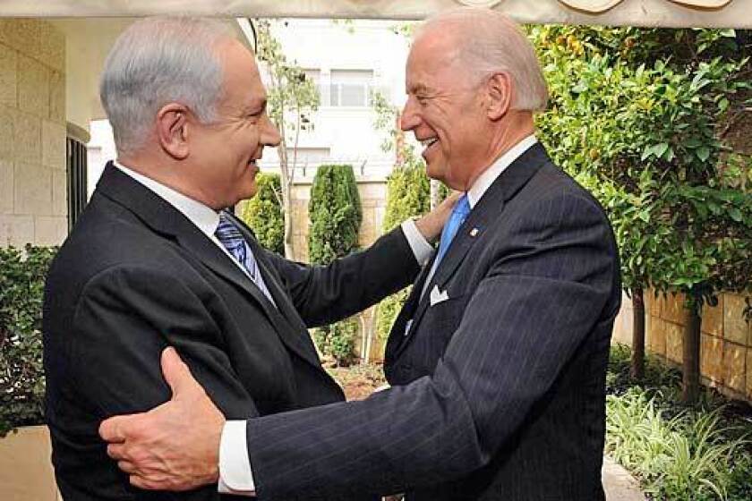 Vice President Biden embraces Israeli Prime Minister Benjamin Netanyahu outside the Israeli leader's Jerusalem residence.