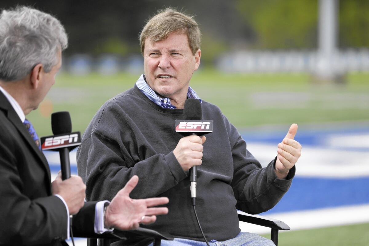 Sports agent Leigh Steinberg, right, is interviewed before the Memphis NFL football pro day April 6. Quarterback Paxton Lynch, Steinberg's client, was selected by the Super Bowl defending champion Denver Broncos at No. 26 in the first round of the NFL Draft.