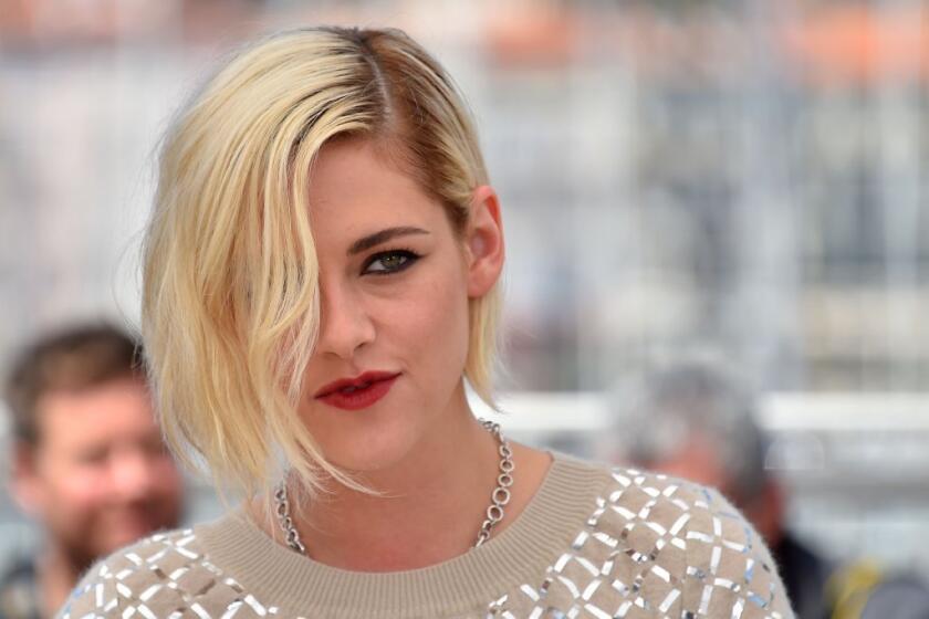 Kristen Stewart pauses during a photo call for the film "Personal Shopper" at the Cannes Film Festival in France.