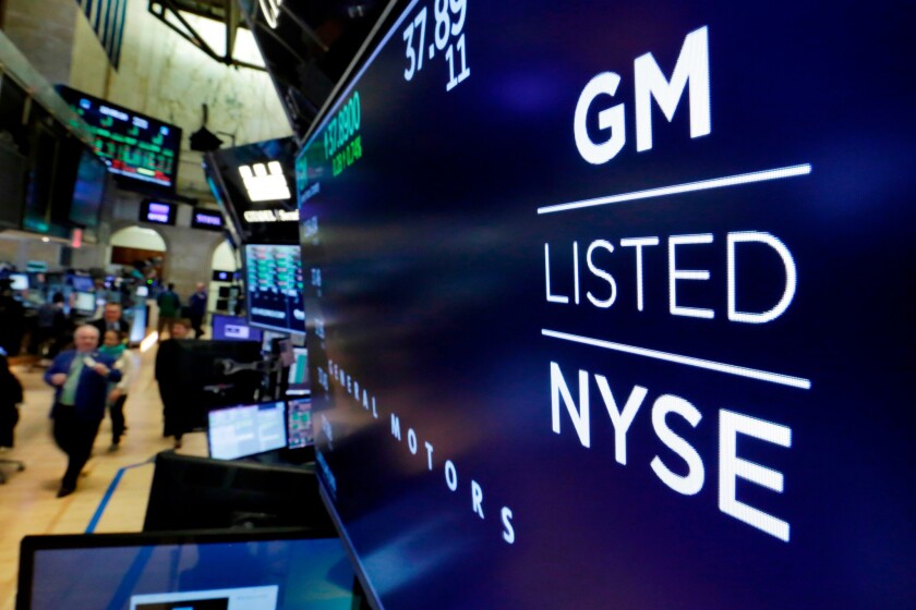 General Motors, facing rising commodity costs in a trade showdown with Europe and elsewhere, cut its outlook for the year. Shares tumbled more than 5 percent before the opening bell, and GM's view of the year ahead dragged down shares of the entire auto sector Wednesday, July 25.