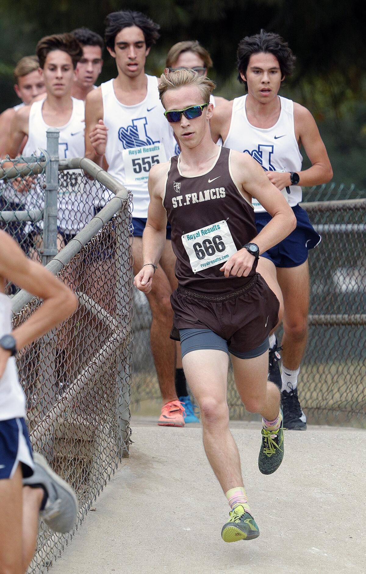 St. Francis' Stuart Serventi crosses the one-mile marker in the boys' Mission League race at the 2019 Mission/Sunshine Cross Country #2 at Crescenta Valley Regional Park on Tuesday, October 15, 2019.