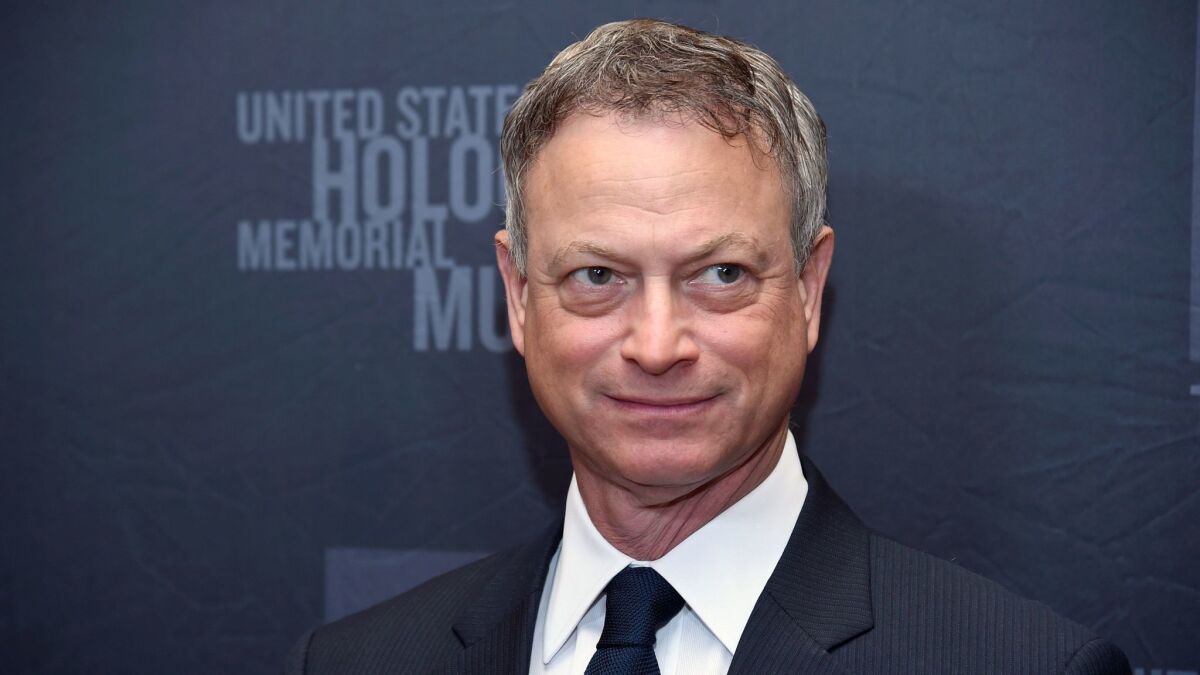 Actor Gary Sinise in a suit and tie