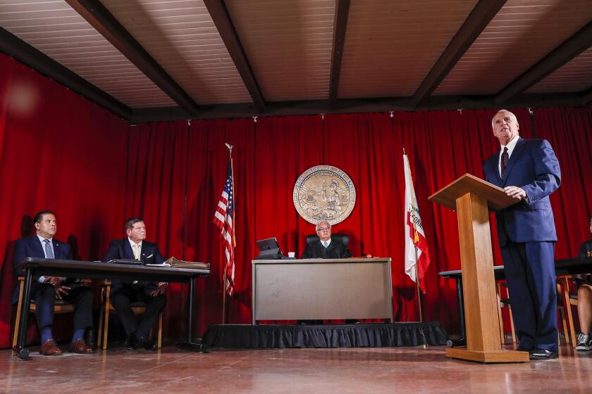 San Bernardino, CA, Thursday, September 15, 2022 - Lawyers and a judge reenact the Lopez v. Seccombe federal court case that desegregated public pools in San Bernardino in 1944. Left to right are - Mayor John Vadivia as Mayor WC Seccombe, Attorney Michael Scaffidi as Atty. H.R. Griffith, Justice Manuel Ramirez as Judge Leon Yankwich and Atty. Michael Bidart as Atty. David C. Marcus. (Robert Gauthier/Los Angeles Times)