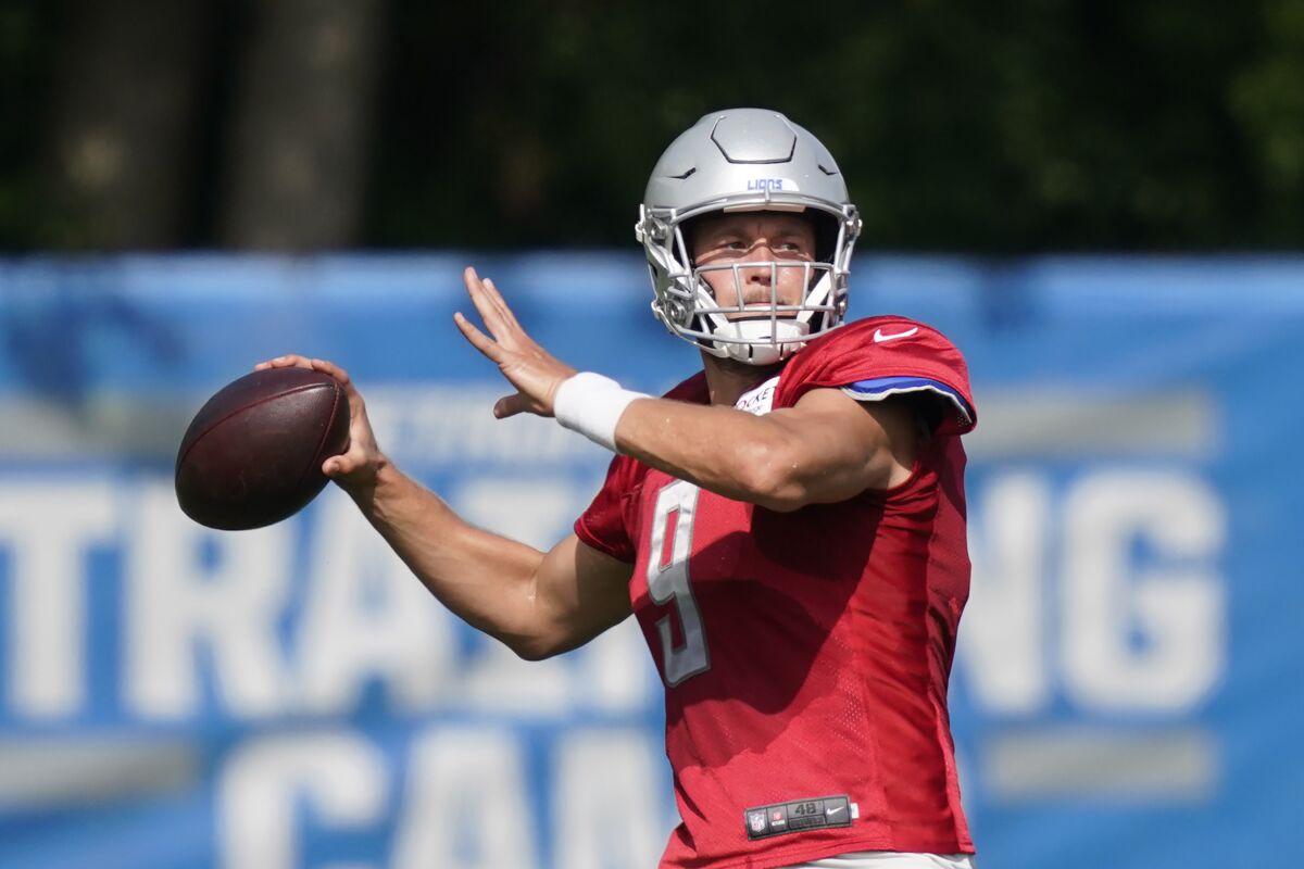Detroit Lions quarterback Matthew Stafford throws during practice in August.