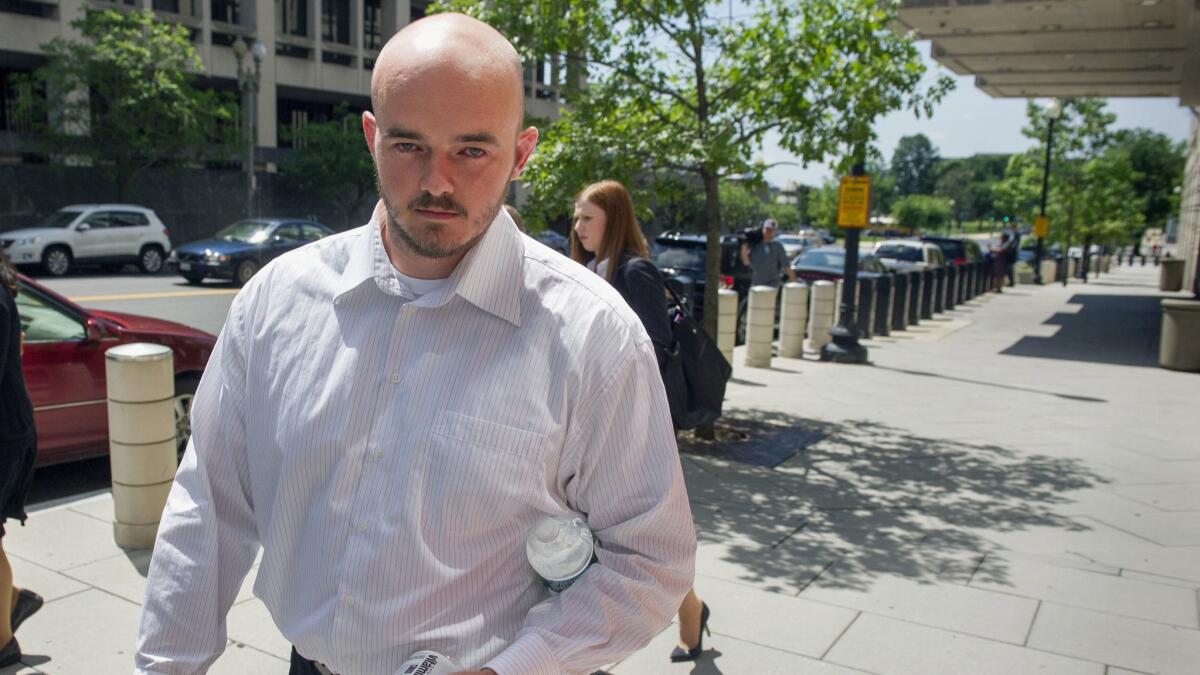 Former Blackwater Worldwide guard Nicholas Slatten leaves federal court in Washington on June 11, 2014.