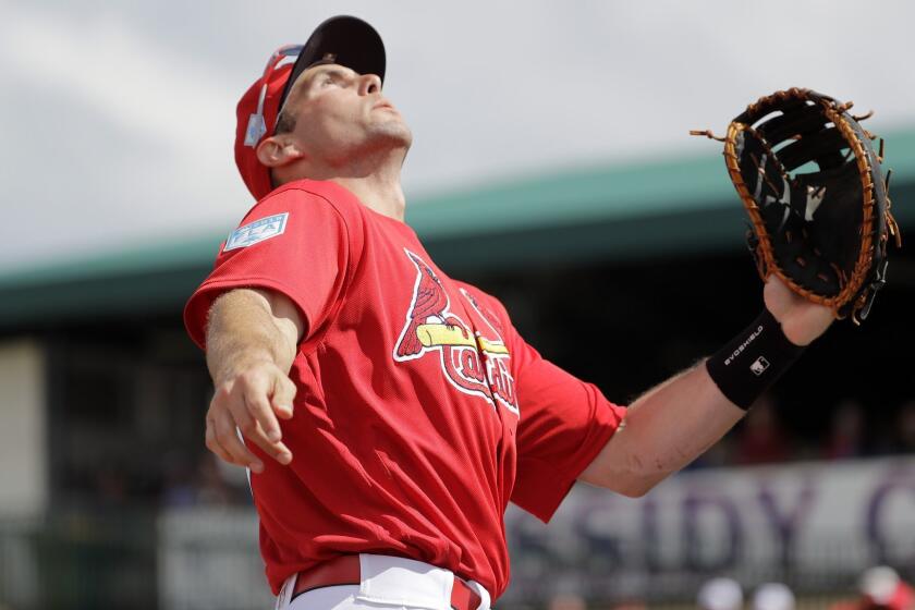 St. Louis Cardinals first baseman Paul Goldschmidt keeps his eye on a pop up during the second inning of an exhibition spring training baseball game against the New York Mets Thursday, Feb. 28, 2019, in Jupiter, Fla. (AP Photo/Jeff Roberson)