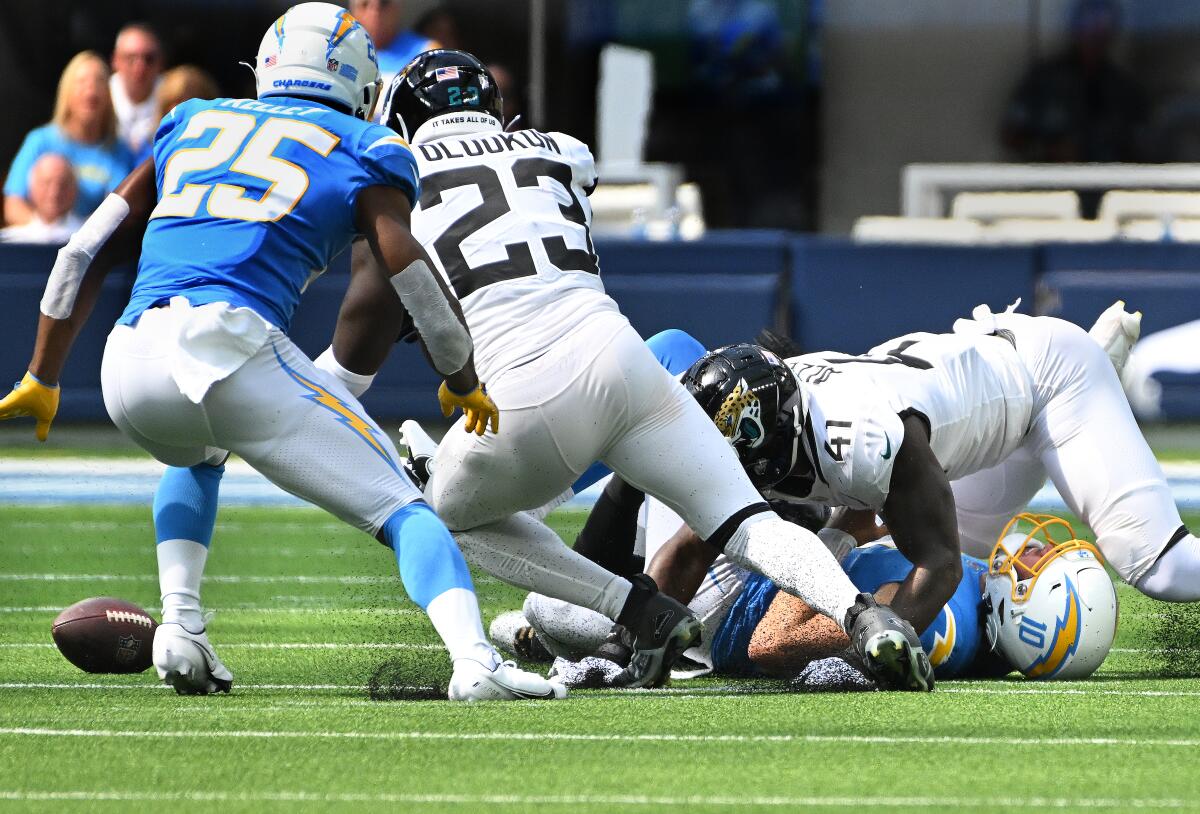 Chargers quarterback Justin Herbert fumbles and the Jaguars recovered it in the second quarter.