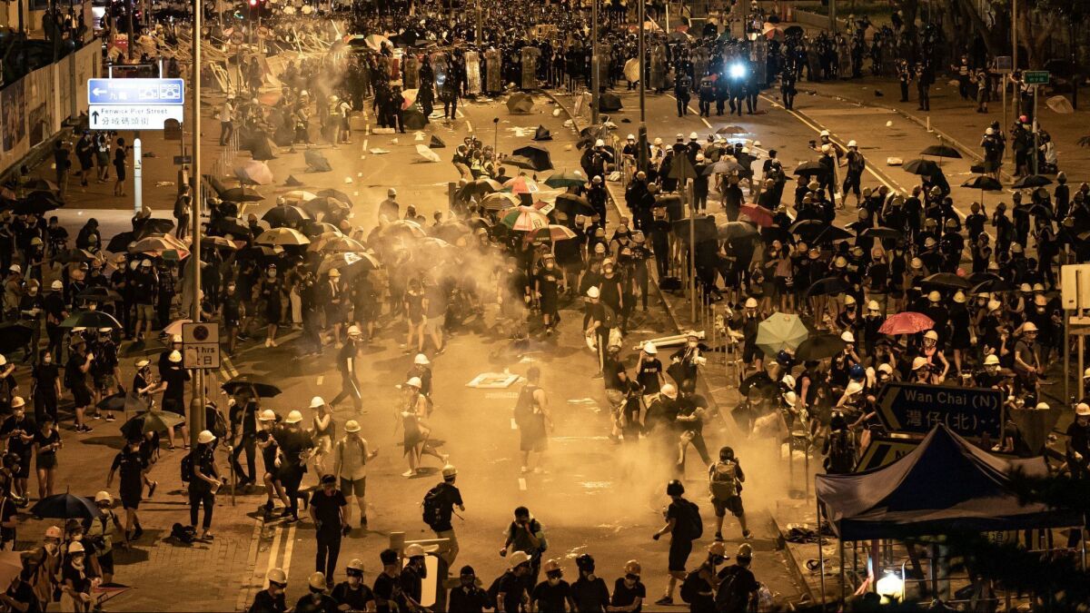 Police in Hong Kong fire tear gas at protesters outside the Legislative Council complex on July 2, 2019.