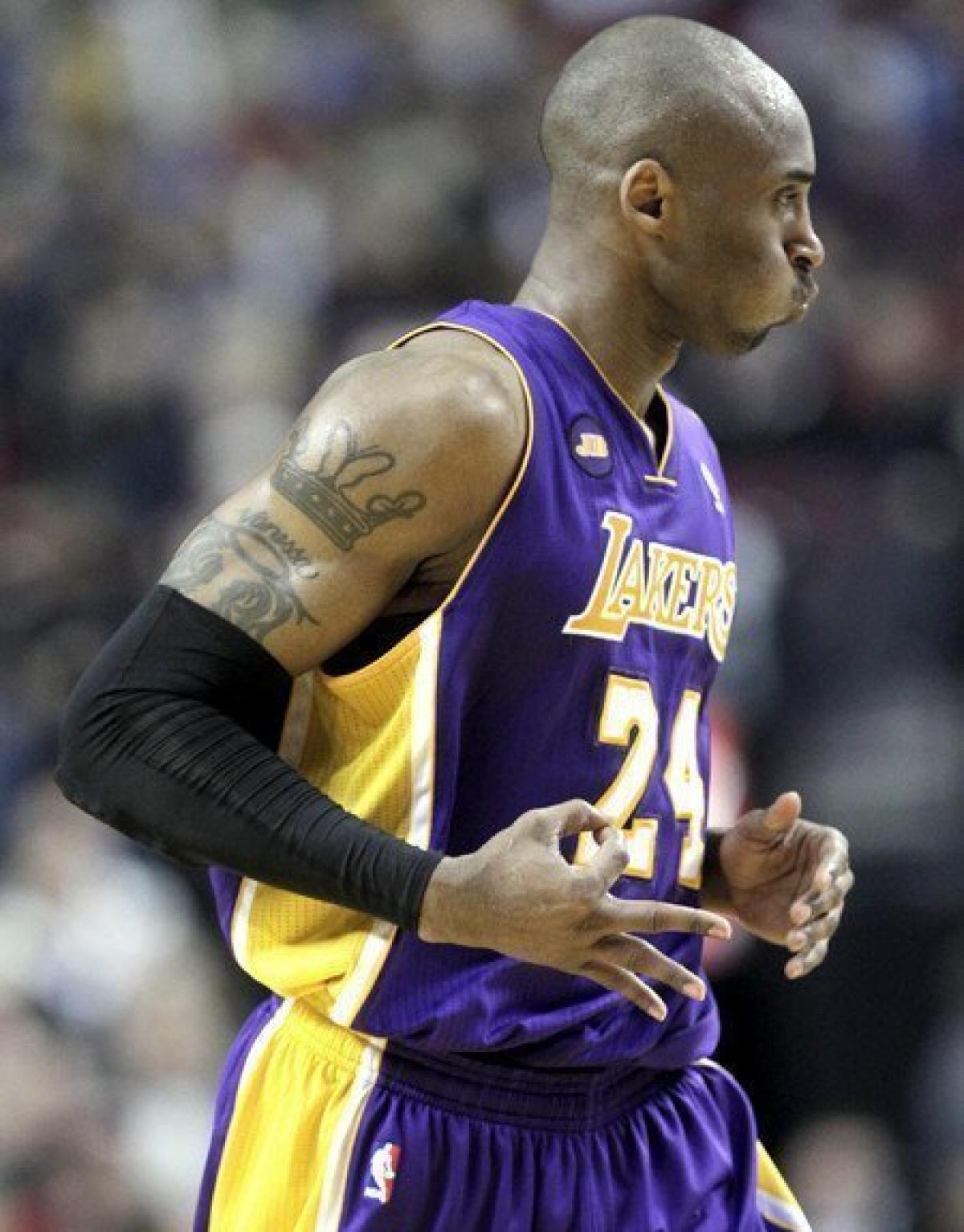 Lakers guard Kobe Bryant, shown last season against the Portland Trail Blazers, continues to work on his recovery from an Achilles' tendon injury.
