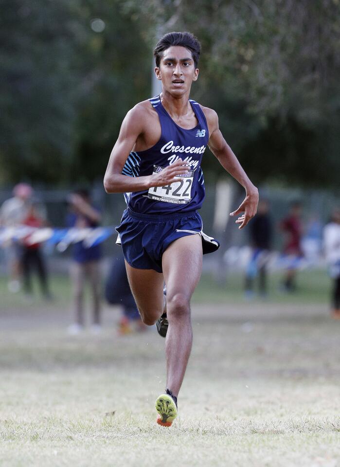 Crescenta Valley's Manan Vats runs to the finish in first place in the Pacific League cross country finals at Crescenta Valley Community Regional Park in La Crescenta on Thursday, November 1, 2018. Burbank girls place first in the girls' team competition, and Crescenta Valley boys placed first in the boys' team competition.