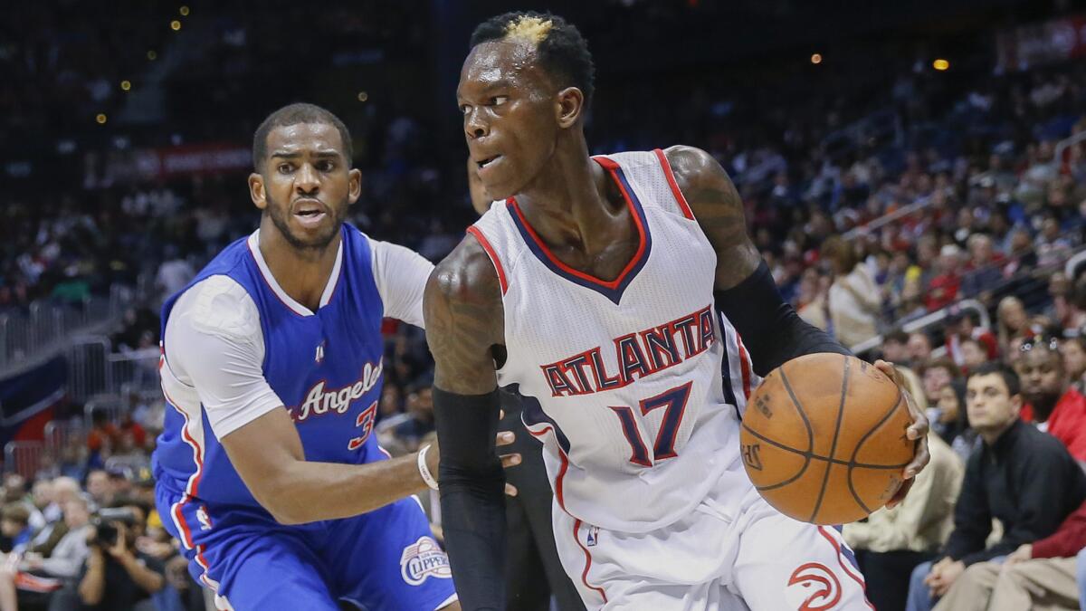 Atlanta Hawks guard Dennis Schroeder drives past Clippers guard Chris Paul during Los Angeles' loss on Dec. 23.