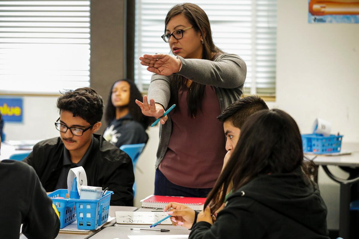 Patricia Matos teaches a math class at Huntington Park Institute of Applied Medicine.