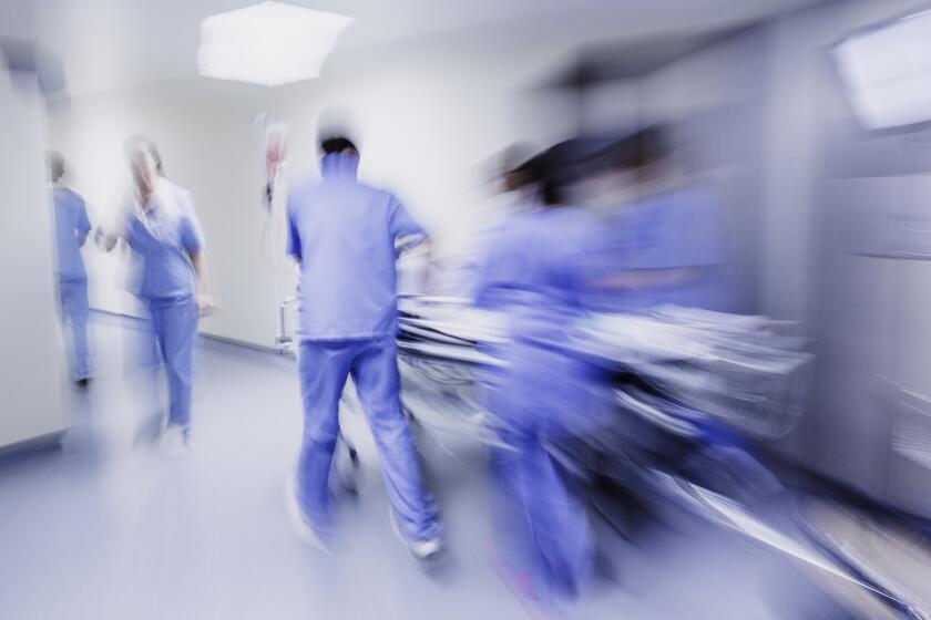 Medical personnel attend to a hospital emergency. A new report from the Centers for Disease Control and Prevention enumerates the leading causes of deaths for Americans in 2014.