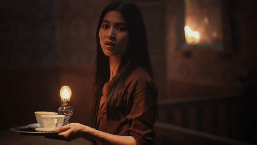 Nhung Kate in the movie "The Housemaid."