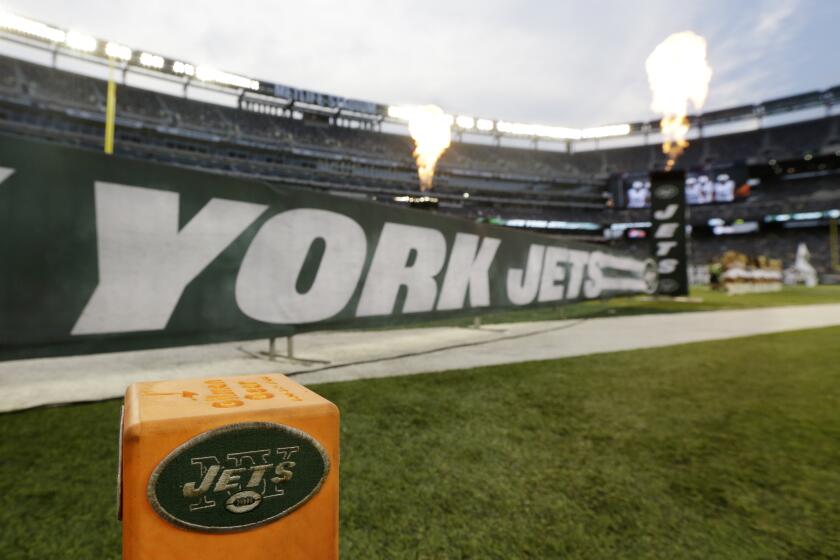 The New York Jets logo is seen on a pylon 