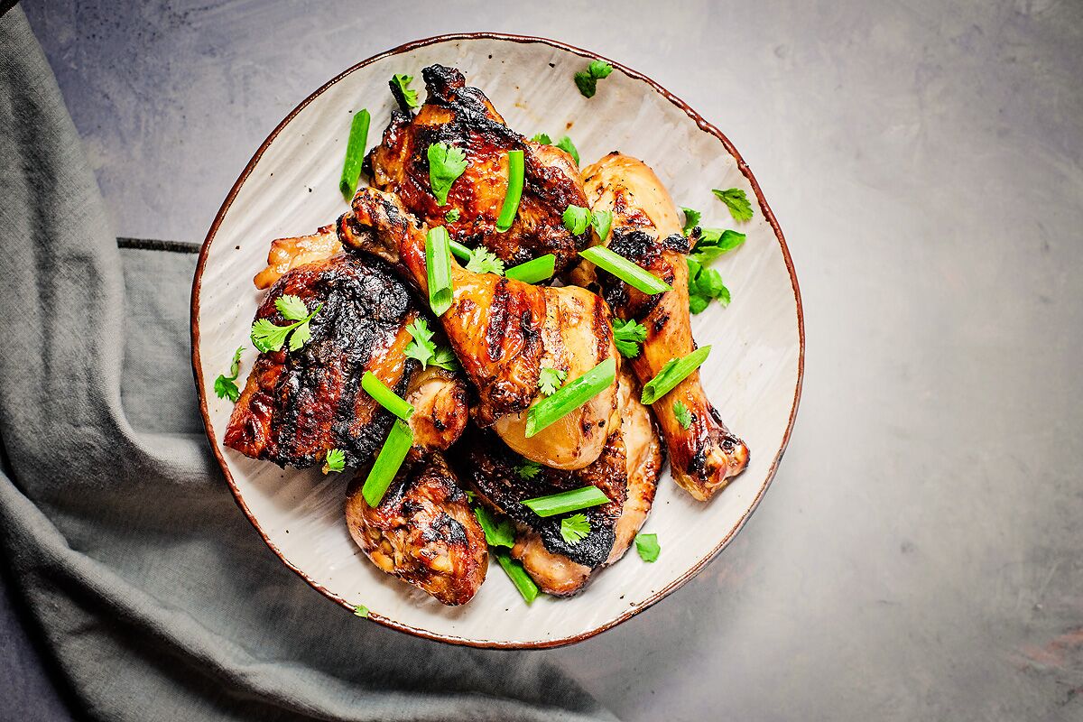 A plate of Grilled Soy Sauce Chicken.
