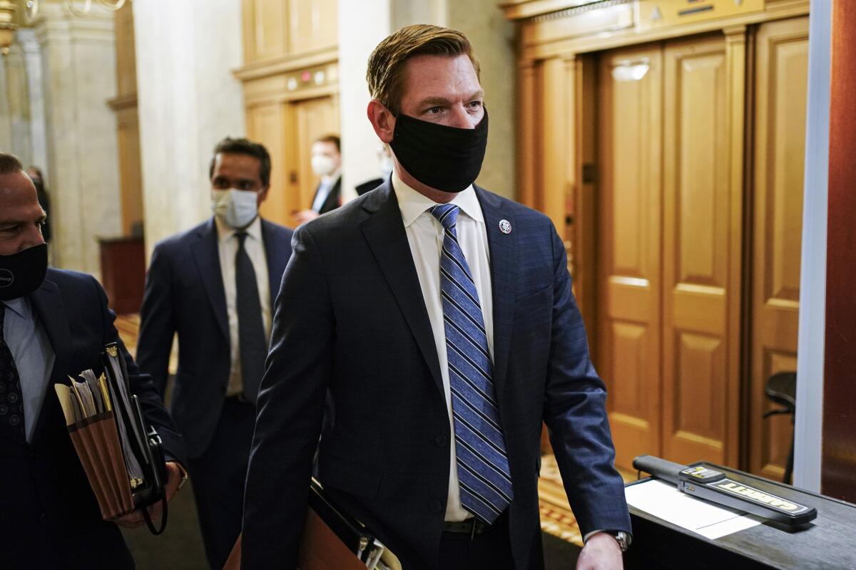 Rep. Eric Swalwell walks through the Capitol