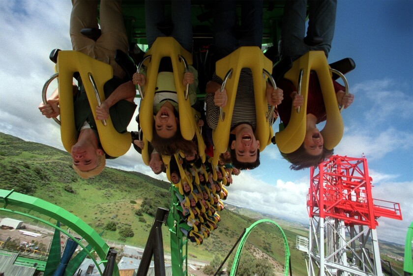 Guests at Six Flags Magic Mountain in Valencia ride the Riddler's Revenge coaster before the pandemic.