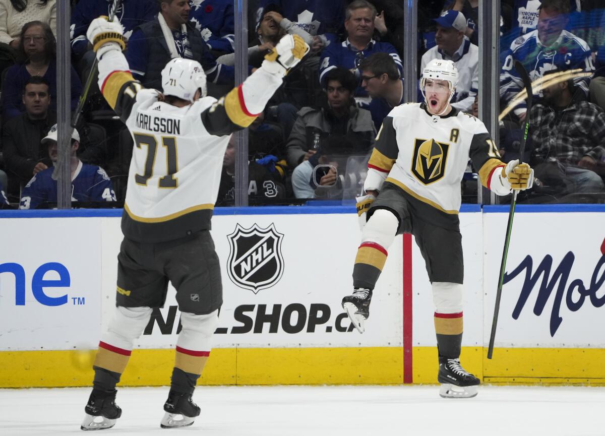Vegas Golden Knights forward Reilly Smith (19) reacts after scoring the game winning goal in overtime against the Toronto Maple Leafs in an NHL hockey game, Tuesday, Nov. 8, 2022 in Toronto. (Nathan Denette/The Canadian Press via AP)
