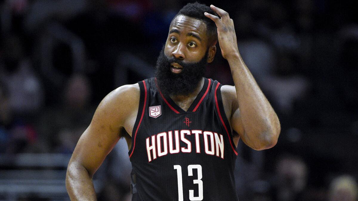 Rockets guard James Harden, shown during a game last week, finished with 38 points, 11 assists and 10 rebounds against the Cavaliers on Sunday.