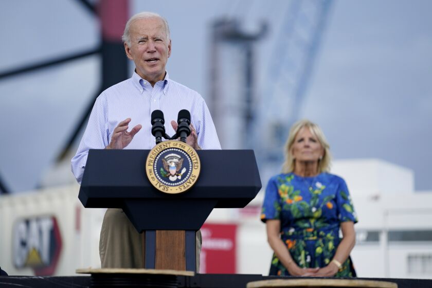 President Joe Biden, with first lady Jill Biden, delivers remarks on Hurricane Fiona, Monday, Oct. 3, 2022, in Ponce, Puerto Rico. (AP Photo/Evan Vucci)