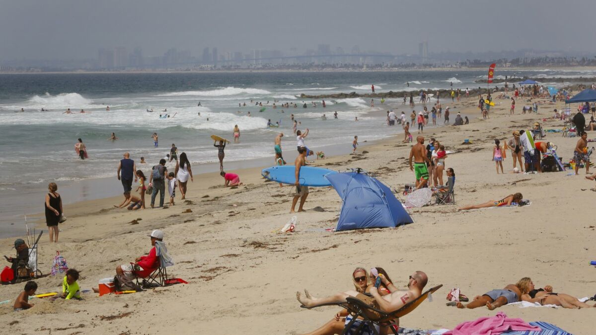 Large crowds spent time at the beach in Imperial Beach last year for the Labor Day weekend.
