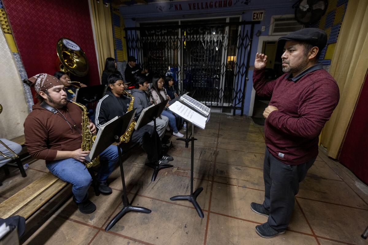 Director/founder Estanislao Maqueos conducts a band rehearsal at Maqueos Music Academy, where students learn Oaxacan music