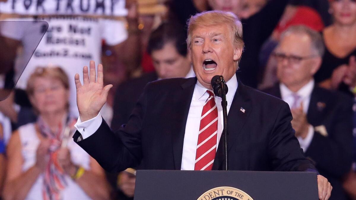 President Trump speaks at a campaign-style rally in Phoenix on Tuesday.