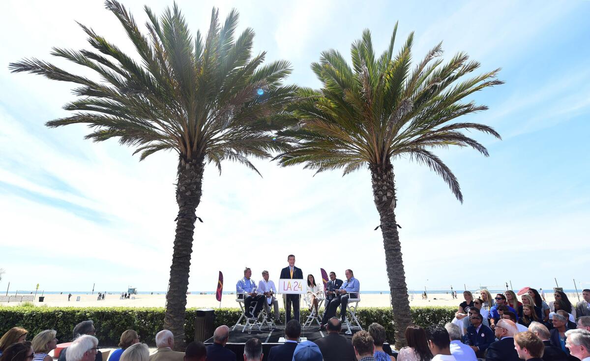 Mayor Eric Garcetti addresses the audience on a stage at the Annenberg Beach House in Santa Monica after the City Council voted unanimously to go forward with a bid to host the 2024 Summer Olympic Games.