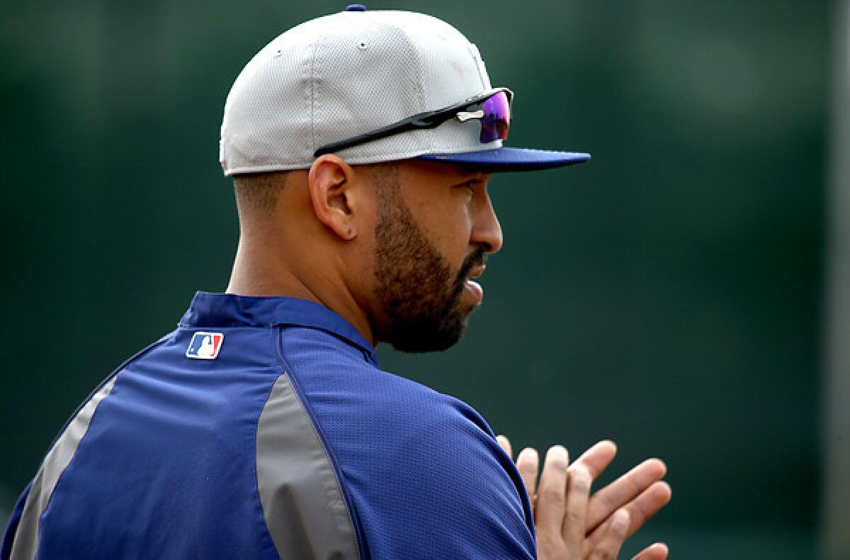 Dodgers center fielder Matt Kemp prepares to take batting practice during a spring training workout last month at Camelback Ranch.