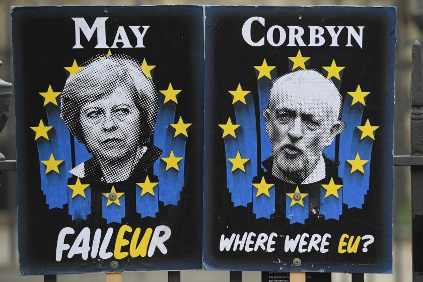 Mandatory Credit: Photo by FACUNDO ARRIZABALAGA/EPA-EFE/REX (10185486bd) Posters mocking British politicians outside the Houses of Parliament in Westminster, central London, Britain, 03 April 2019. Reports state that British Prime Minister Theresa May is expected to meet Labour opposition leader Jeremy Corbyn later in the day looking for a way to to break the Brexit deadlock. May also is to ask the EU for an extension to the Brexit deadline. Brexit developments in London, United Kingdom - 03 Apr 2019 ** Usable by LA, CT and MoD ONLY **