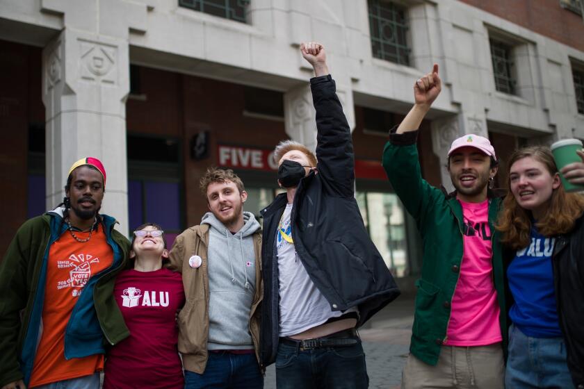 Amazon Labor Union (ALU) members celebrates after an update during the voting results to unionize Amazon warehouse on Staten Island, N.Y., Friday, April 1, 2022, in Brooklyn borough of New York. If a majority of Amazon workers ultimately votes yes in either Staten Island or Bessemer, Ala., it would mark the first successful U.S. organizing effort in the company’s history. (AP Photo/Eduardo Munoz Alvarez) (AP Photo/Eduardo Munoz Alvarez)