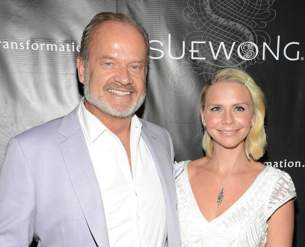 Actor Kelsey Grammer and his wife, Kayte Walsh, attend the Sue Wong Fall 2013 Great Gatsby Collection Unveiling and Birthday Celebration in Los Angeles.