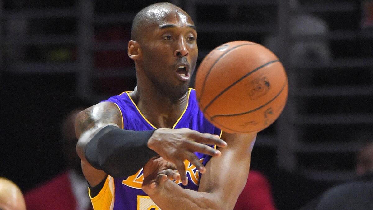 Lakers guard Kobe Bryant passes during a loss to the Clippers at Staples Center on Jan. 7.