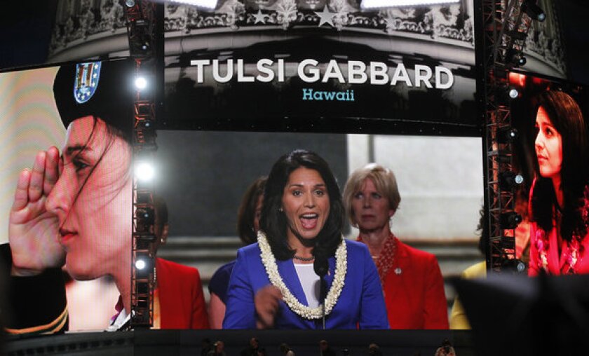 Tulsi Gabbard addresses delegates during the opening night ceremonies of the Democratic National Convention 2012.