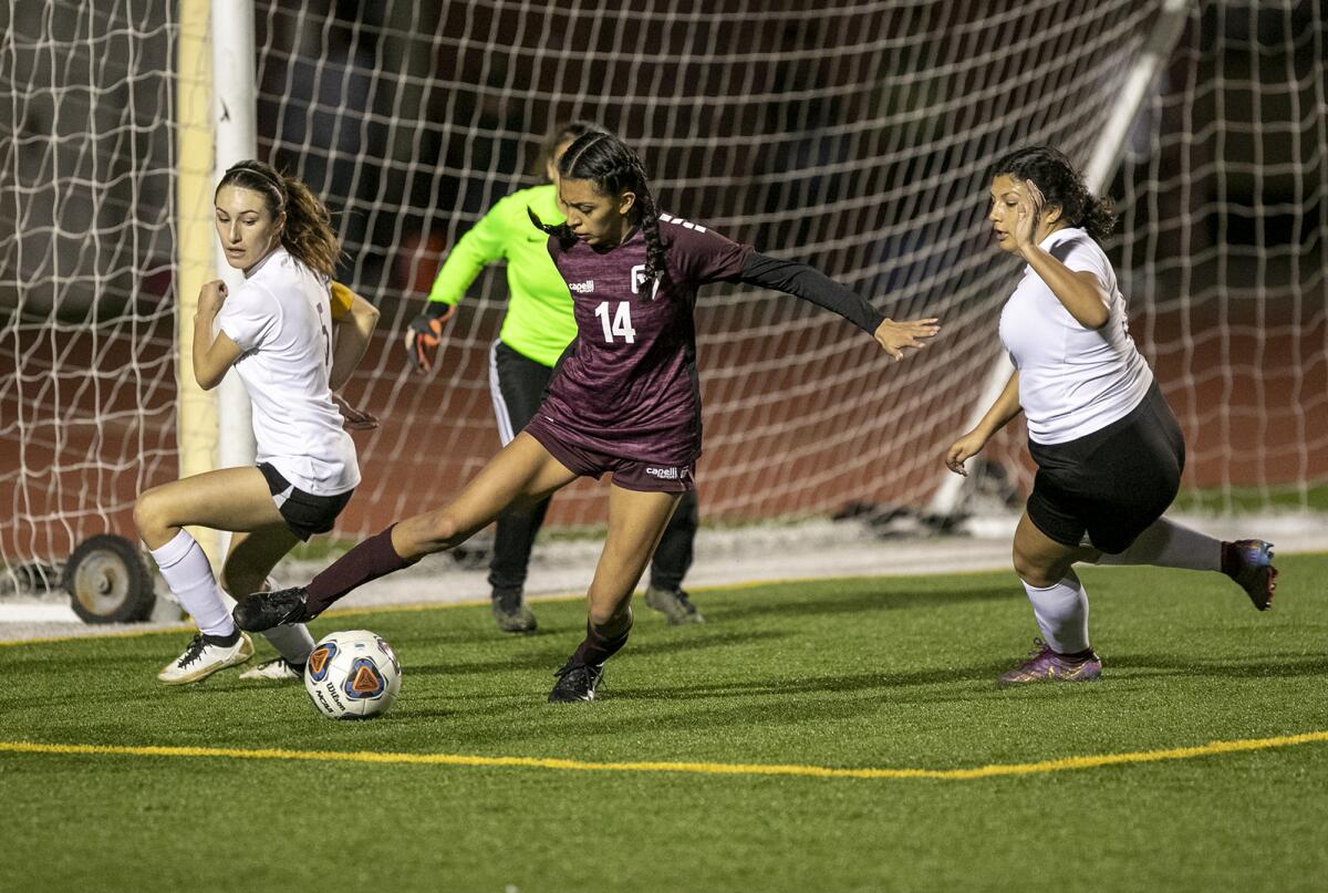 Ocean View's Isis Salazar pulls the ball back across the goal before scoring against University Prep in Wednesday's game.