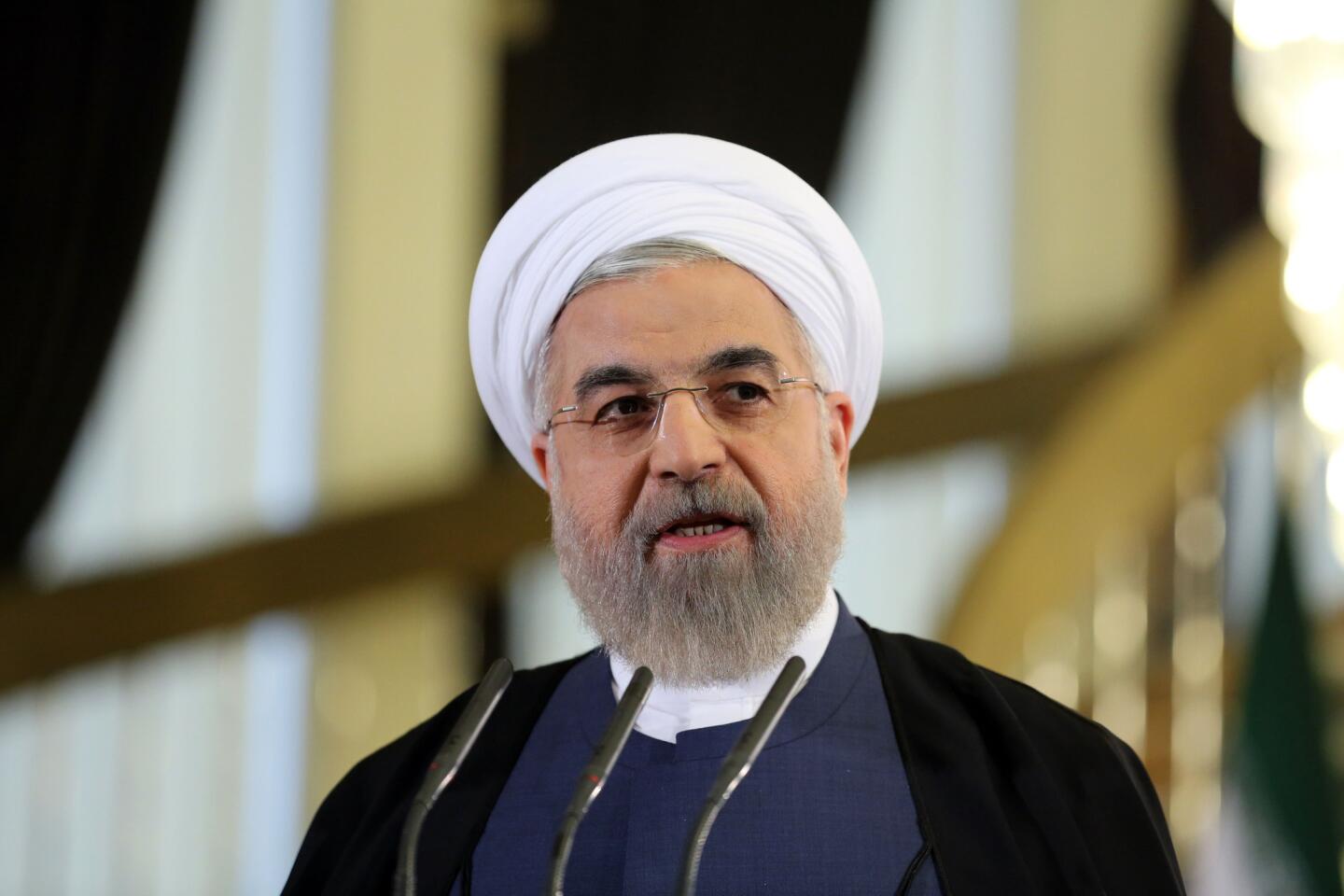 Iranian President Hassan Rouhani speaks during a press conference in Tehran on April 3, 2015. Iran vowed to stand by a nuclear deal with world powers as Rouhani promised it would open a "new page" in the country's global ties.