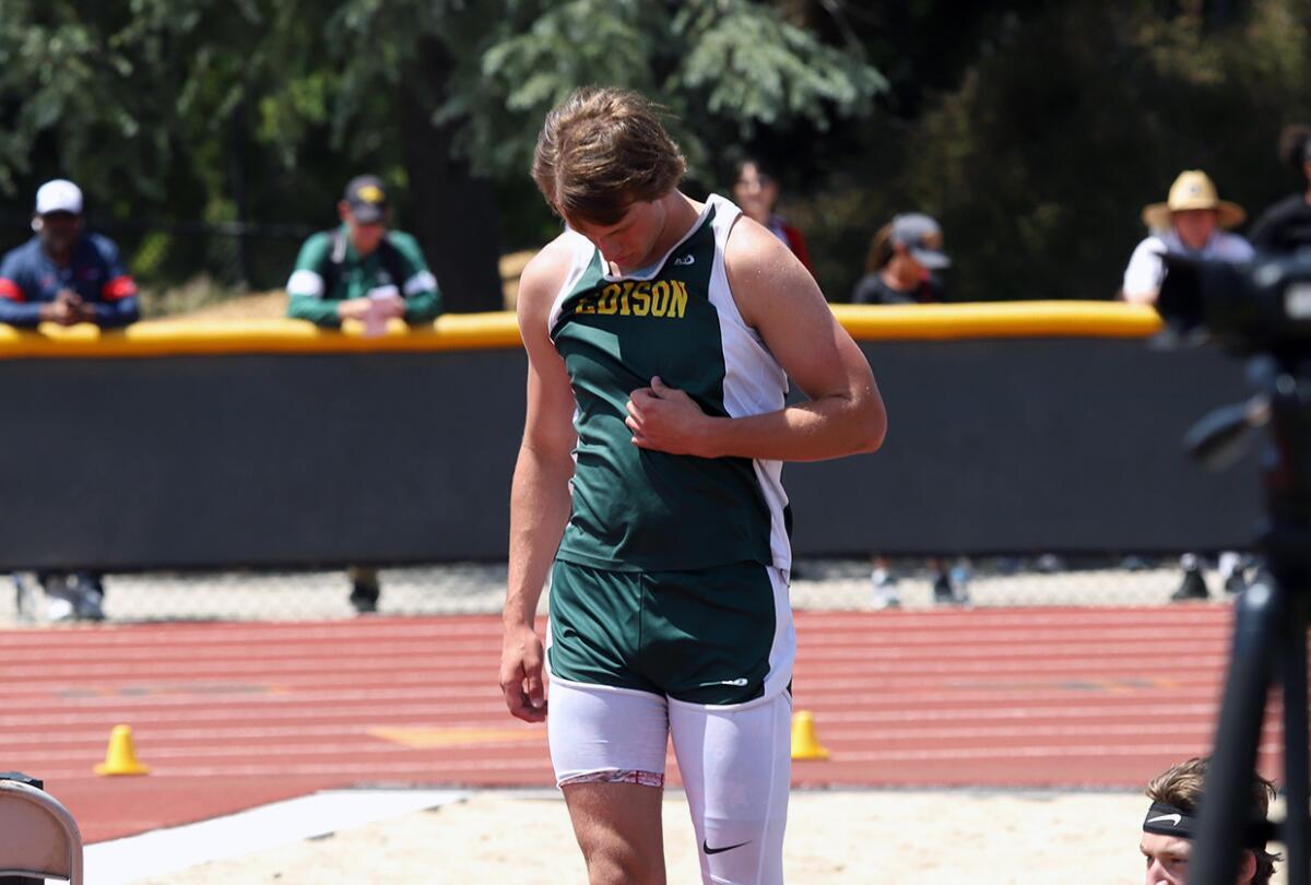 Edison's Tyler Hampton reacts after his postseason run in boys' high jump ended at the CIF Southern Section Masters Meet.
