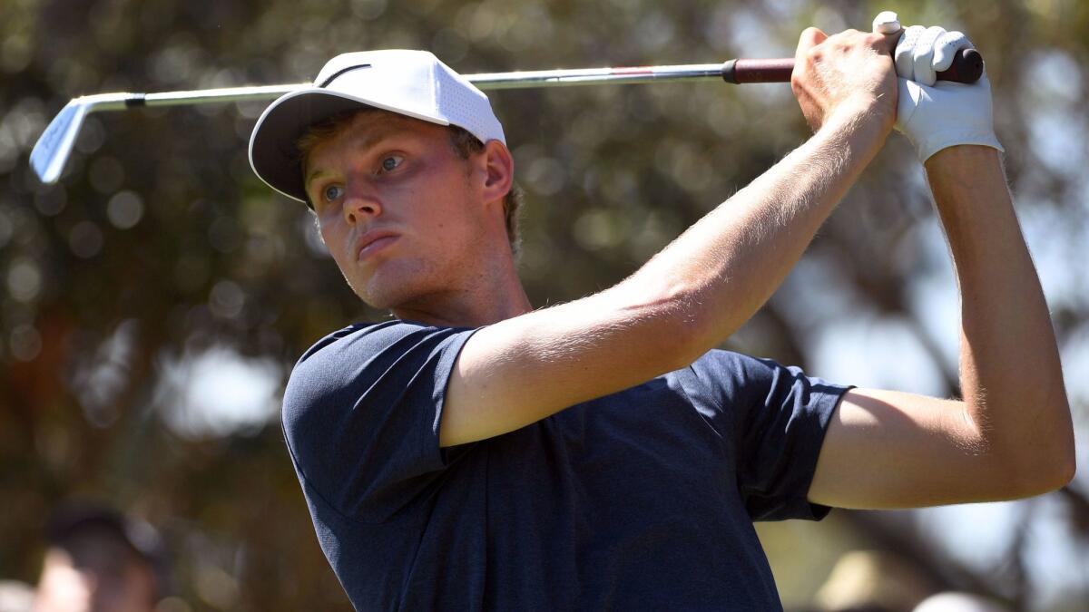 Cameron Davis of Australia shot a brilliant final round of seven-under-par 64 to win the 102nd Australian Open after a wild finish to the tournament.