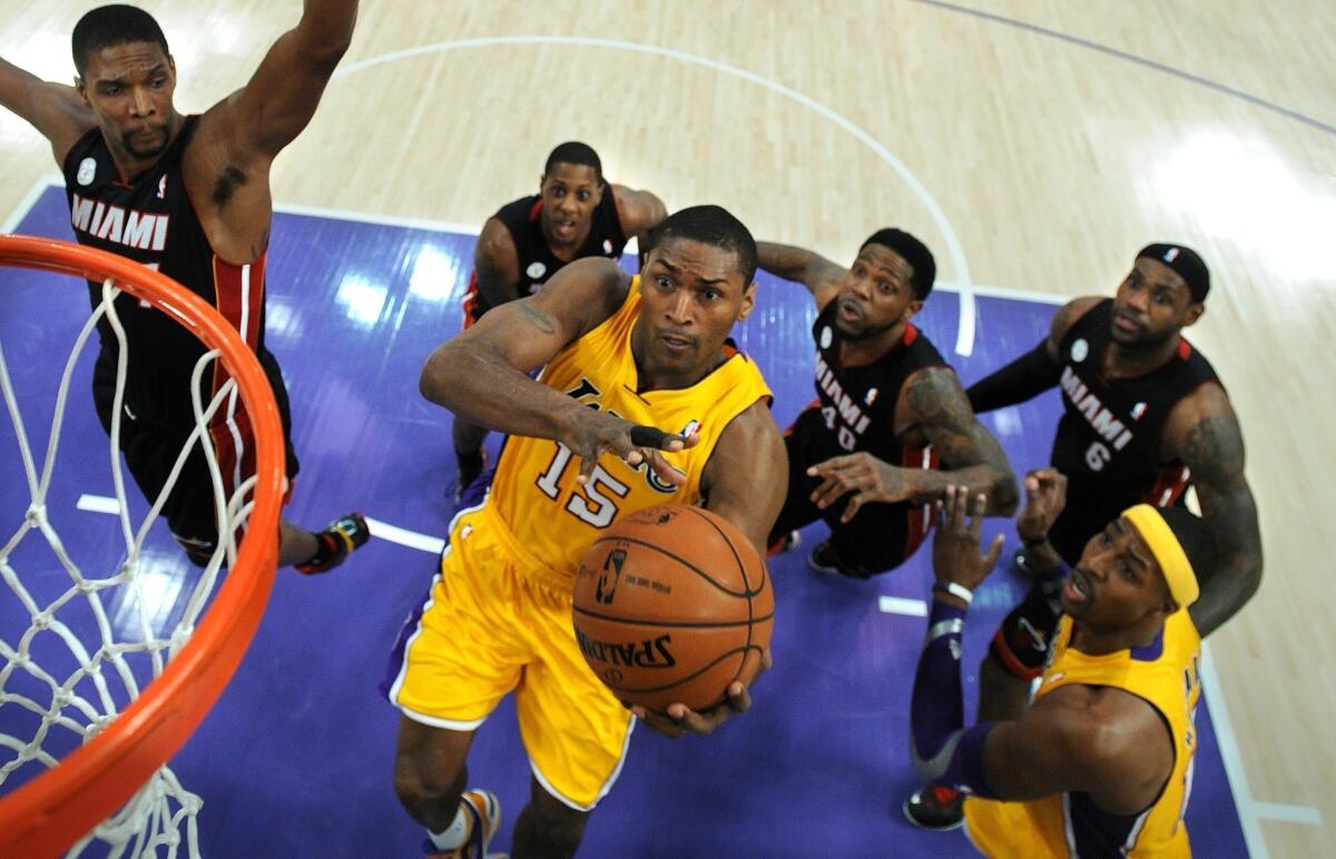 Lakers forward Metta World Peace doesn't intend to opt out of the final season of his $7.7 million contract.