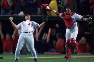 Robert Lachman –– – ANGELS/GIANTS...Angel relief pitcher Troy Percival and catcher Bengie Molina.