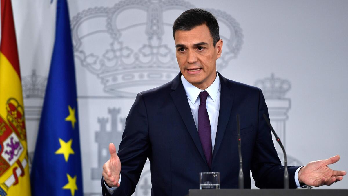 Prime Minister Pedro Sanchez holds a news conference Friday after a Cabinet meeting in Madrid.