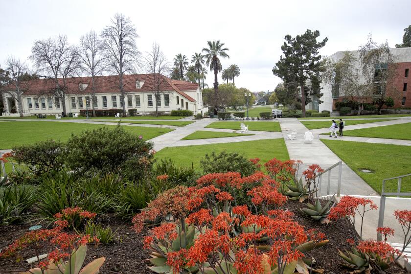 WHITTIER, CA-MARCH 16, 2023: Students walk on the campus of Whittier College in Whittier. The school is roiling in controversy. (Mel Melcon / Los Angeles Times)