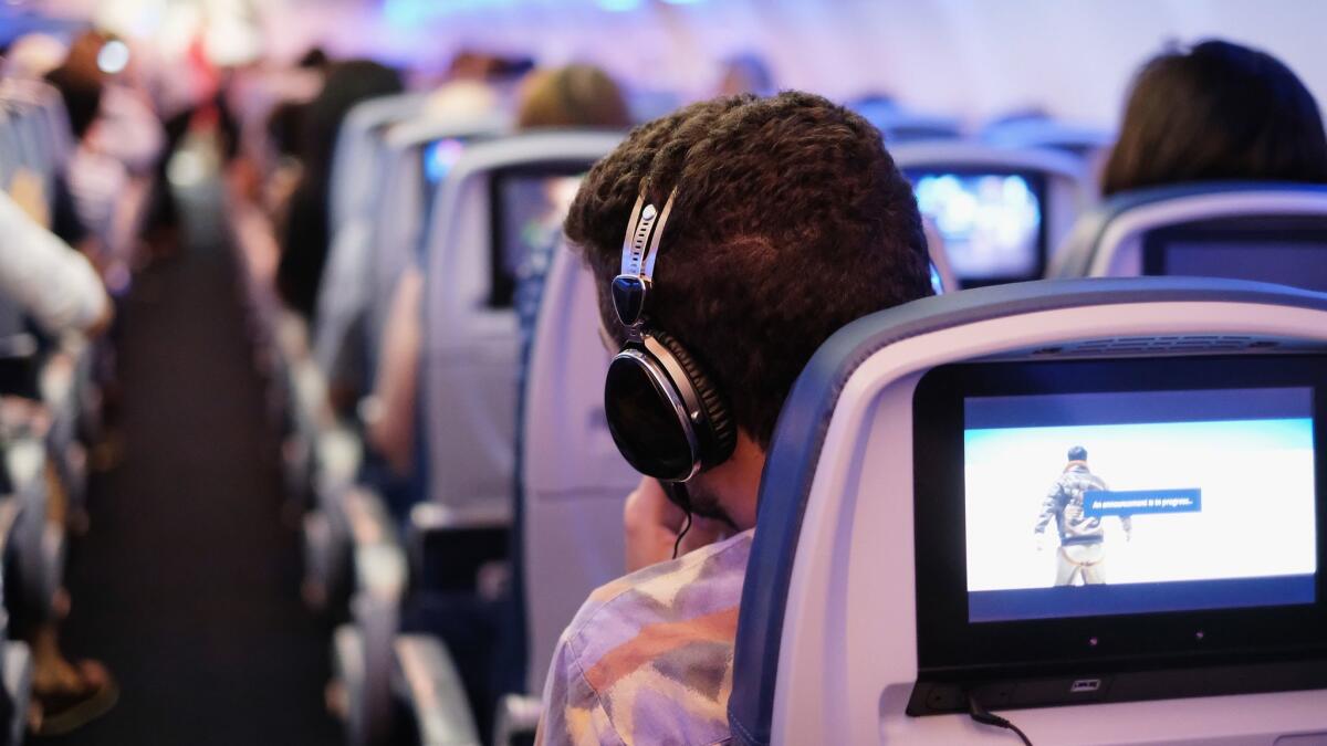 In-flight entertainment may include seat-back screens -- or they may not.