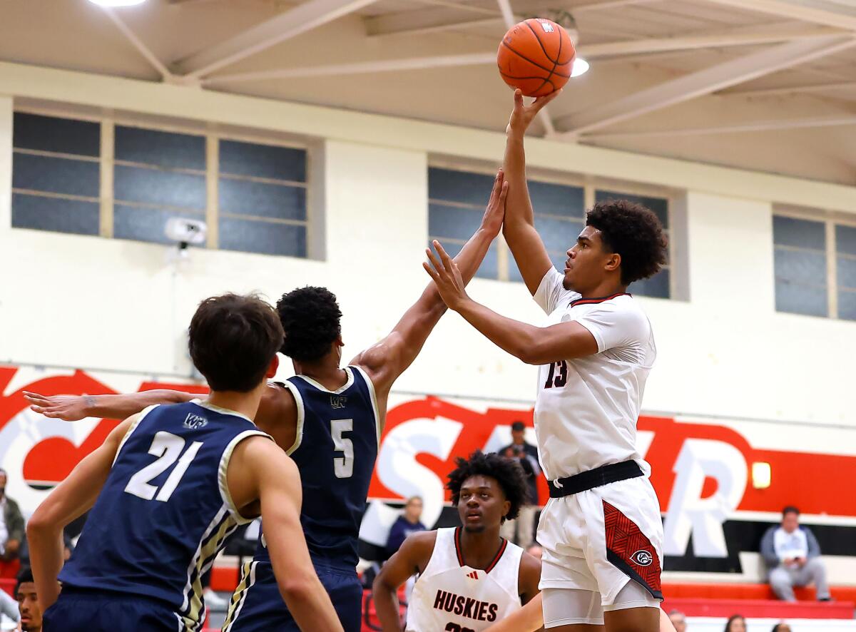 Corona Centennial's Eric Freeny, a UCLA commit, puts up shot against West Ranch. He finished with 31 points.