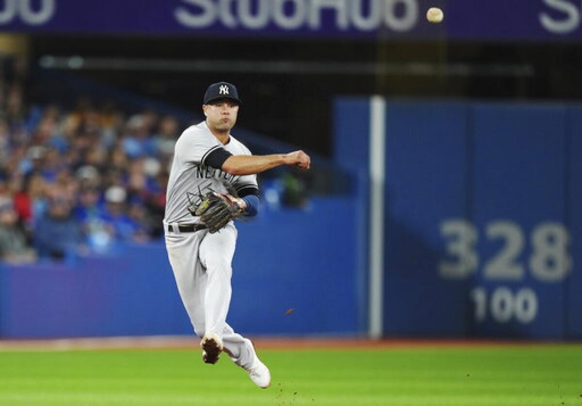 New York Yankees' Isiah Kiner-Falefa rounds third on the way to