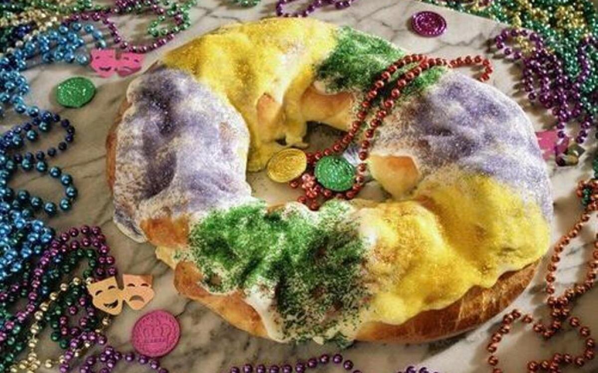Mardi Gras king cake with cream cheese and apple fillings
