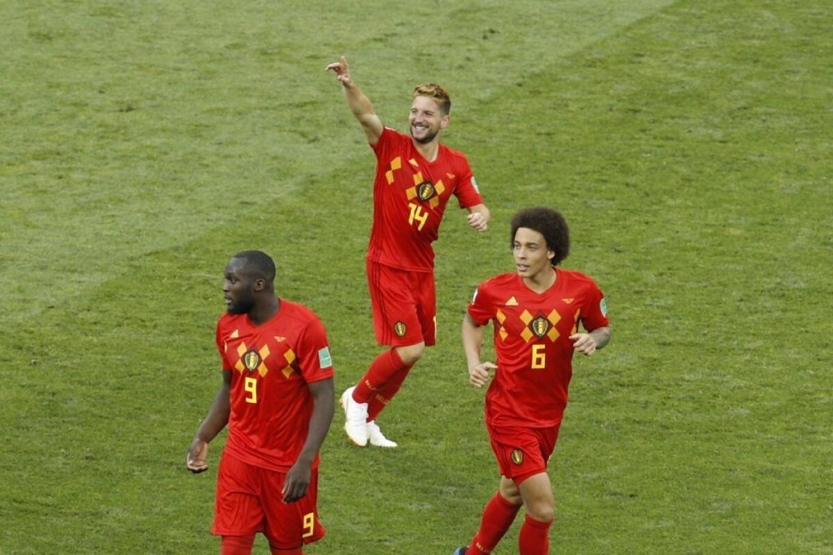 Belgium's Dries Mertens, top, celebrates after scoring the opening goal during a group G match against Panama on June 18.
