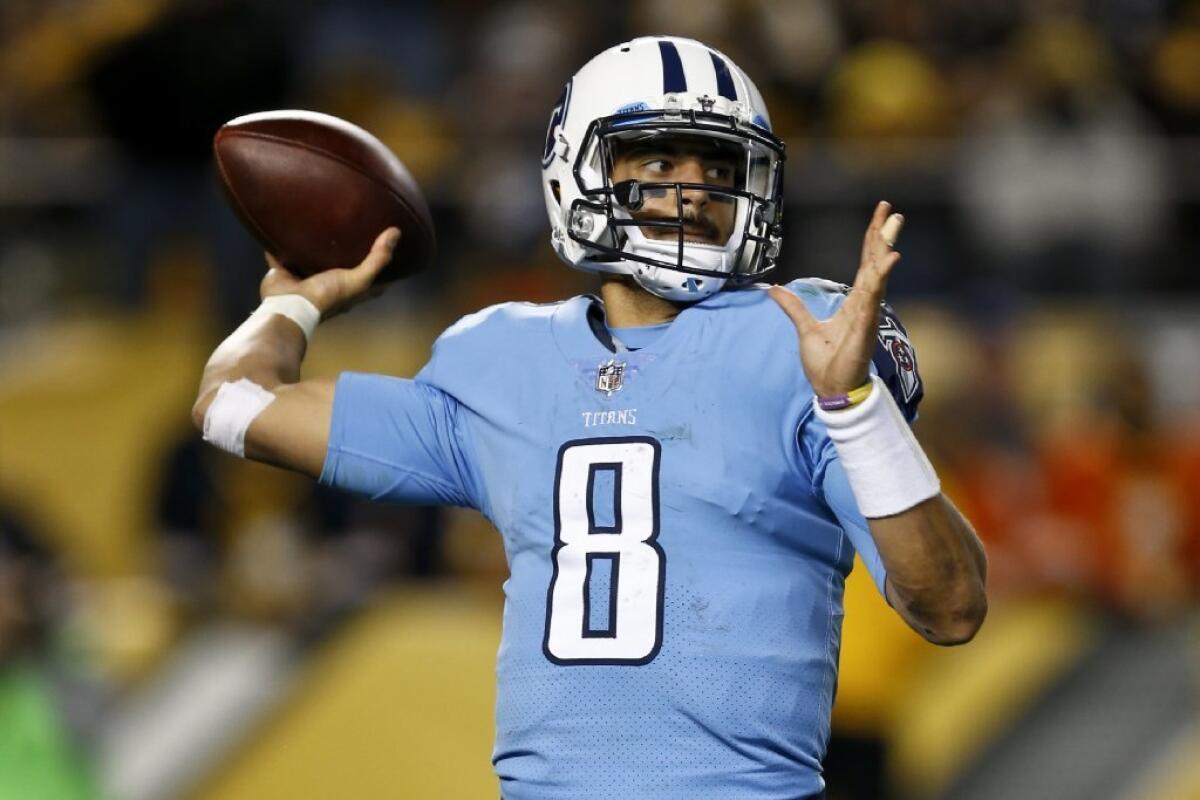 Titans quarterback Marcus Mariota looks to pass during a game against the Steelers on Thursday Night Football.